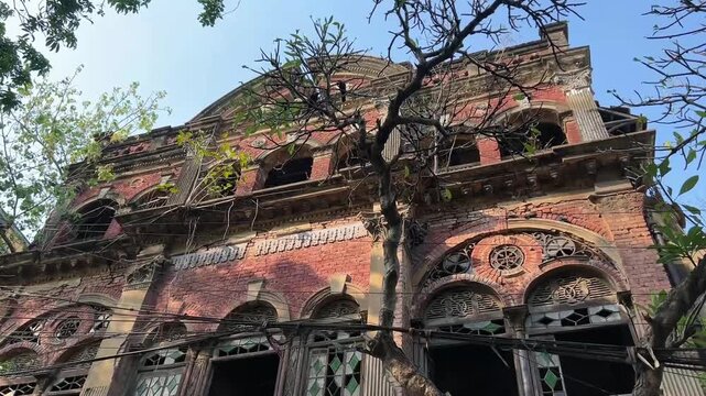 An ancestral residential building in the old quarters of Kolkata, showcasing classic 19th-century masonry and colonial-era design influences.