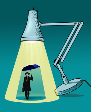 A businessman strays in the shade because he wants to keep a low profile around the office. He holds an umbrella when in the spotlight of a desk lamp .