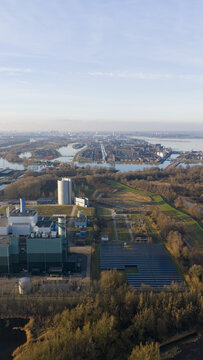 Aerial view of the Vattenfall Elektriciteitscentrale Diemen power plant with solar panels and industrial structures near the waterfront Diemen, Noord-Holland, Netherlands.