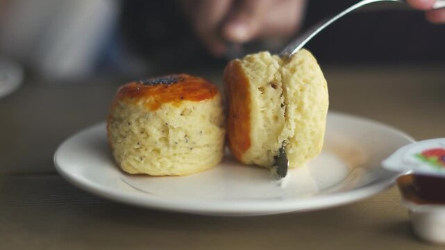 close up cutting a scone