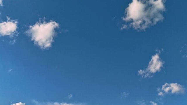 A hyperlapse sequence capturing the richly layered sky at dusk. Clean copy space in the center makes this ideal for title cards, presentations, and promotional overlays.
