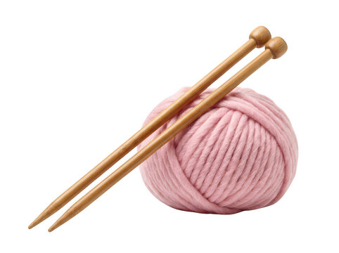 Chunky soft pink wool yarn ball with a pair of natural wooden bamboo knitting needles leaning diagonally against it for DIY craft hobbies isolated transparent background image