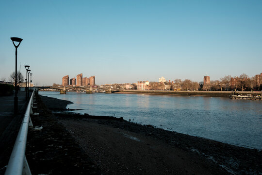 Putney bridge spanning river thames in london cityscape