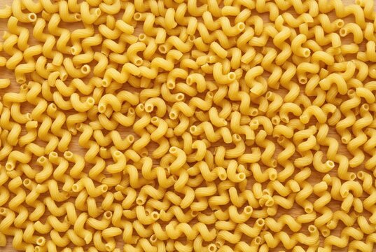 Abundant uncooked cavatappi pasta creating a seamless texture