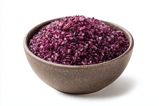Bowl of purple rice grains healthy organic food ingredient isolated on white background
