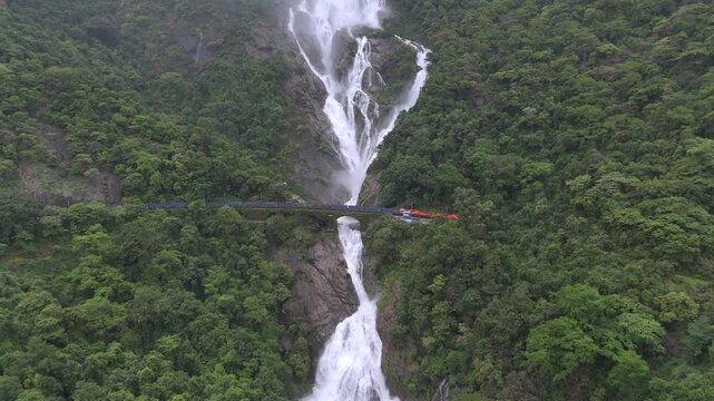 Aerial View of Dudhsagar Waterfall with Train Crossing Bridge in Goa India
