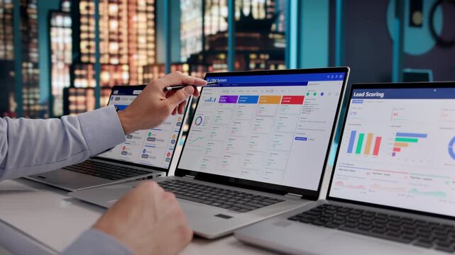 Software Developer Analyzing CRM Data To Improve Company Sales