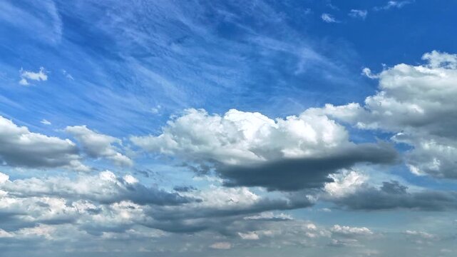 A hyperlapse sequence capturing the richly layered sky at dusk. Clean copy space in the center makes this ideal for title cards, presentations, and promotional overlays.