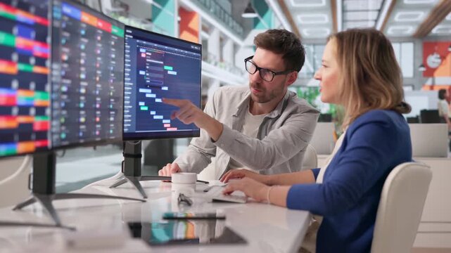 Project Manager Carefully Reviews Calendar And Schedule