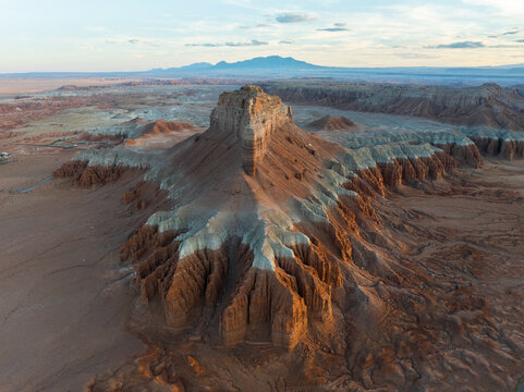 Aerial view of the unique rock formations and eroded sandstone buttes of Goblin Valley State Park under a soft evening sky Green River, Utah, United States.