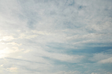 Obraz premium Beautiful clouds illuminated by sunrise. 