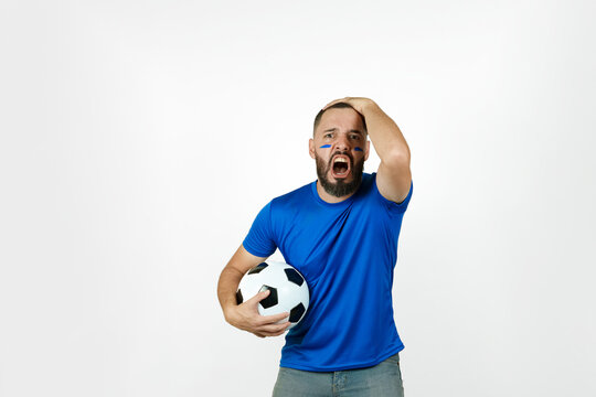 Disappointed soccer fan reacting to game failure
