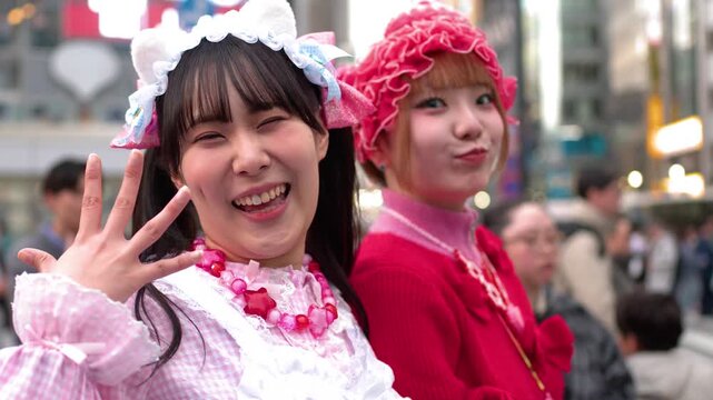 Two Young Women in Decora Fashion Taking a Selfie in Shibuya Tokyo
