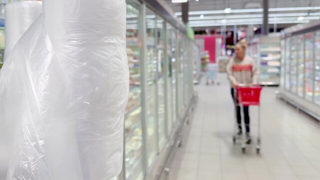 Choosing food from shelf at the supermarket,vegetables in the grocery section, Grocery stores 