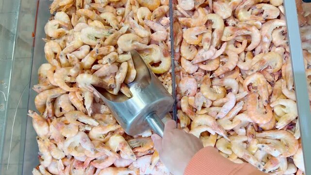 Buying shrimps at the grocery store	