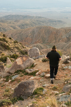 ginger man in beanie at keys view at sunset