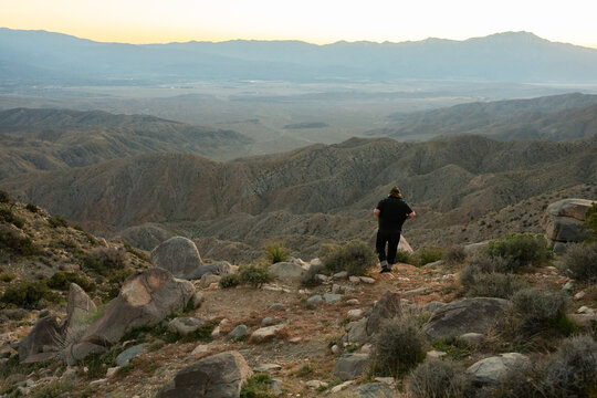 ginger man in beanie at keys view at sunset