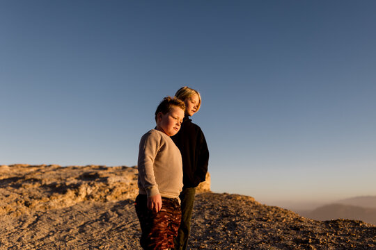 Brothers Standing at Font's Point at Sunset in Borrego Springs, CA