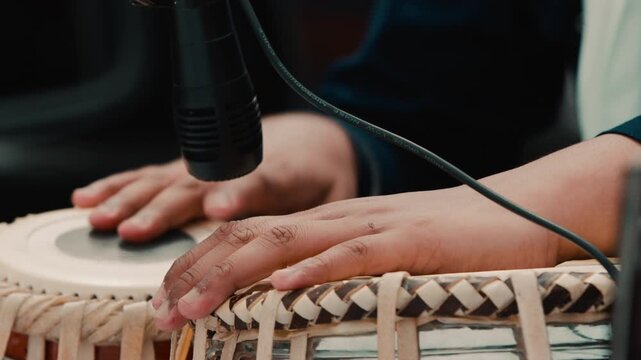Traditional tabla drums played by hand child musician during the Holi festival