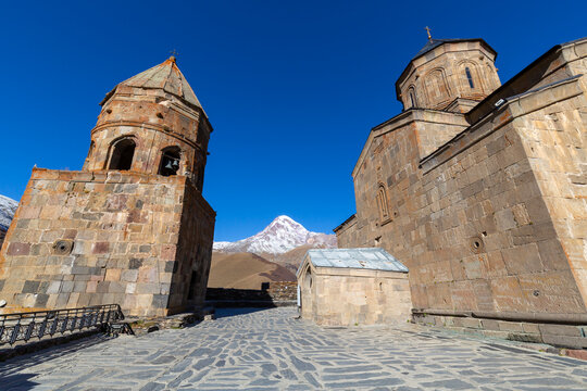 View of Gergeti Trinity Church near the village of Stepantsminda in Georgia