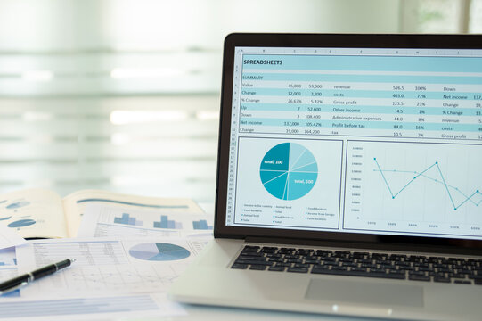 Financial reports on the investment portfolio of stock market, chart values ​​displayed on a laptop screen. finance and investment concept.