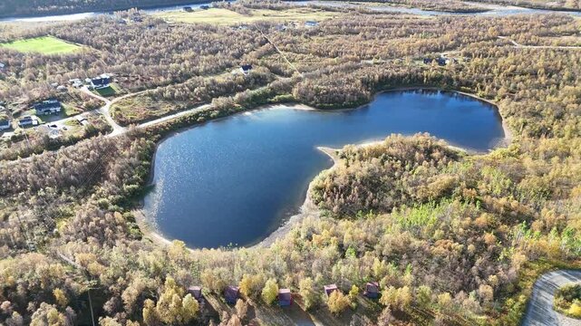 Aerial drone shot of scenic lake near Maze village Finnmark