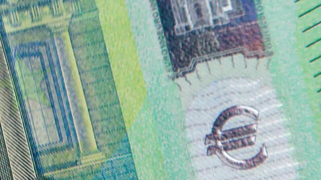Close-up of US and Euro banknotes. Close-up of cash. Finance concept. Inversion and interference effect. 4K