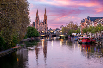 Fototapeta premium Pastel Sunset Canal With Moored Boats Strasbourg