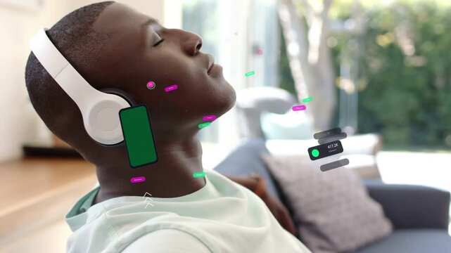 Man reclining listening to audio, headphones playing and spawning AR phone panel around head metric