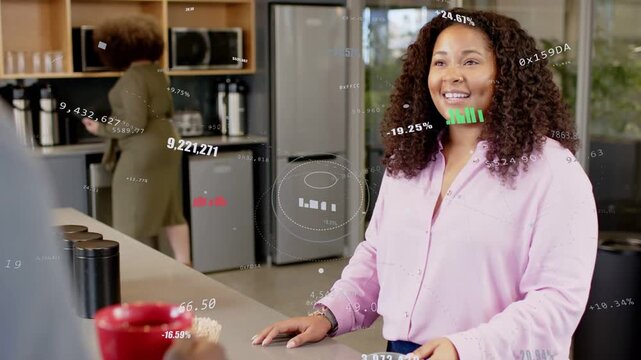 Woman taking mug from offscreen hand while holograms circling face and torso during office break