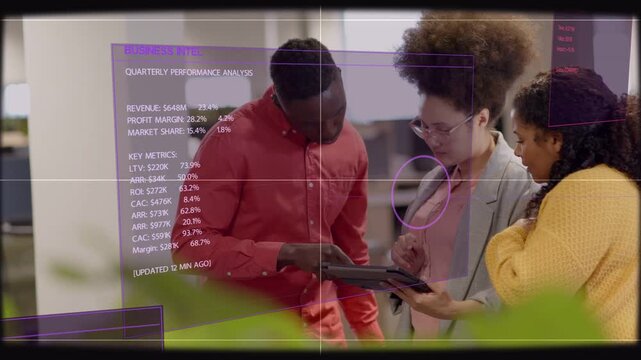 Office team around tablet tapping and swiping generating purple HUD quarterly metrics review