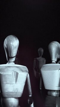 A group of faceless mannequins spinning on an endless loop in a stop motion style.
