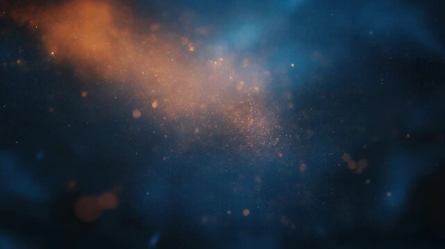 A cosmic scene with golden nebulas and glittering particles against a deep blue background