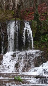 Slow motion video of terraced forest waterfall Dokuzak in Strandzha Mountain near Burgas, Bulgaria
