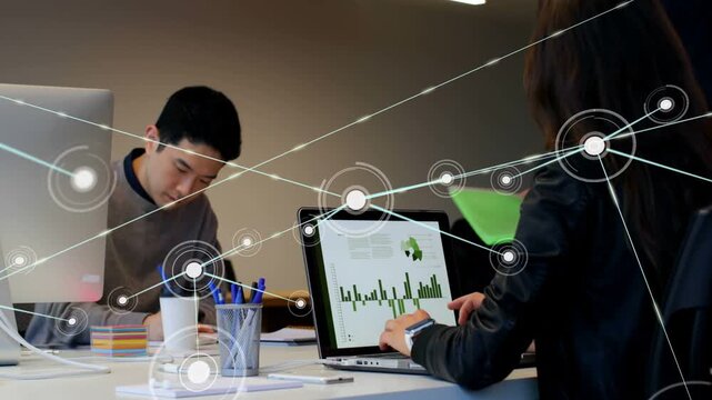 Biz woman tapping laptop starting network growing man noting 3rd placing file reviewing green chart