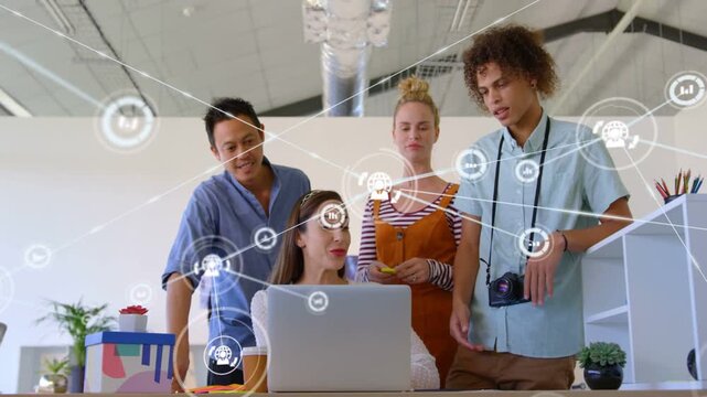 Vertical video: Team working at laptop, overlay appearing then expanding, visualizing connectivity