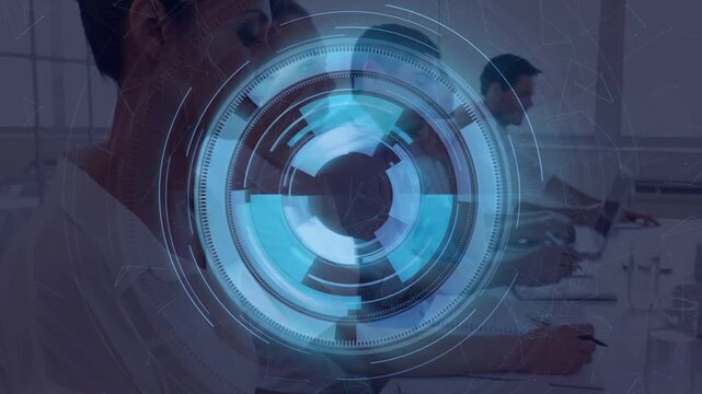 Business team taking notes and typing while blue HUD appearing, expanding, obscuring, showing data