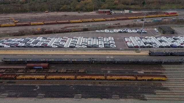 High angle drone shot of extensive rail sidings and train maintenance workyards in Nottinghamshire