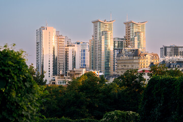 Obraz premium modern city scape of multi apartment skyscraper living buildings