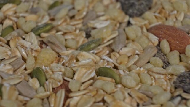 Granola cereal background with smooth diagonal motion macro texture