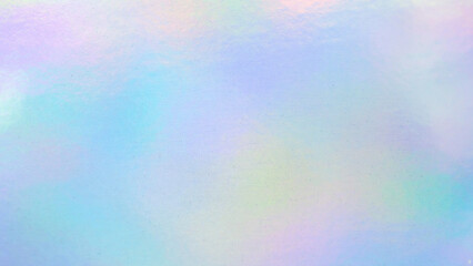 Obraz premium Holographic rainbow foil iridescent texture abstract hologram background