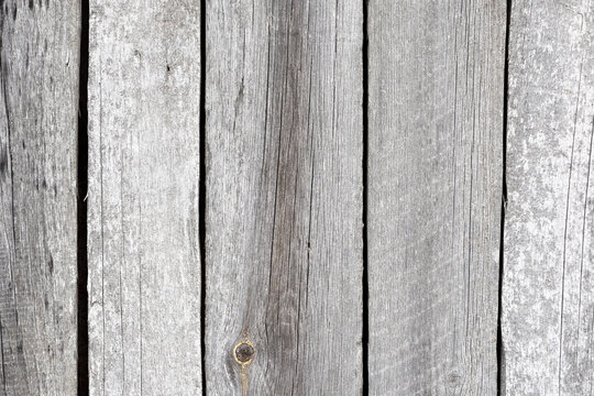 Wooden texture old boards. vertical, vintage boards. Stylish background for presentations and text. Abstract texture of old boards. the wood is destroyed. wood texture. knots, imperfect surface