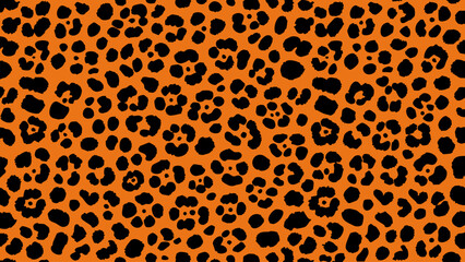 A vibrant, repeating pattern of black spots on an orange background © MdDulal