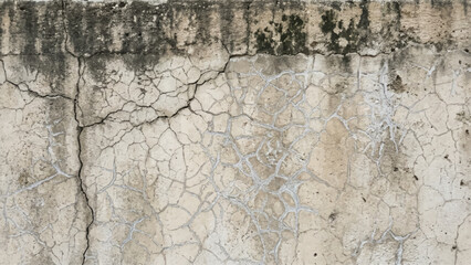 Fototapeta premium Cracked and weathered concrete wall with aged discoloration patterns
