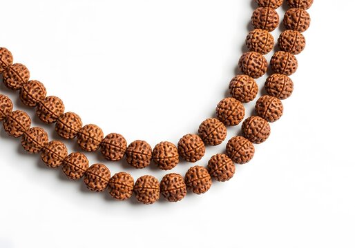 Ultra realistic overhead shot rudraksha japa mala neatly arranged in curved shape on pure white background highly detailed organic bead texture bright soft lighting shadow free minimal composition spi