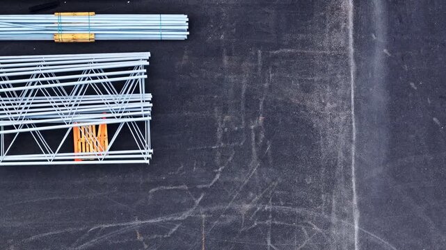 Organizing metal racking systems and wooden pallets for warehouse logistics