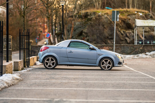 Gothenburg, Sweden - February 01 2026: Blue Opel Tigra Twintop parked in winter urban street.