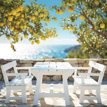 White Wooden Patio Furniture Under Lemon Trees with Ocean View &ndash; Mediterranean Coastal Lifestyle
