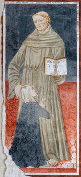 NOVARA, ITALY - JANUARY 16, 2026: The fresco of preacher Michael de Carcanis de Mediolano the church Chiesa di San Nazaro by unknown artis from 15. cent.