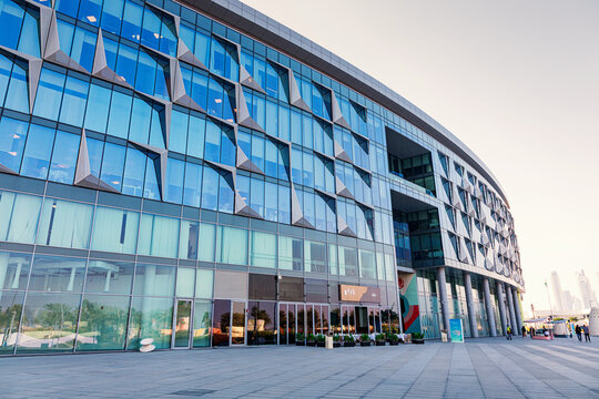 12 January 2026, Dubai, UAE: Contemporary glass and steel building featuring geometric patterns and reflections, located in the urban landscape of Design District